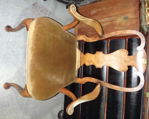 A set of three 18th century style walnut vase back open armchairs.