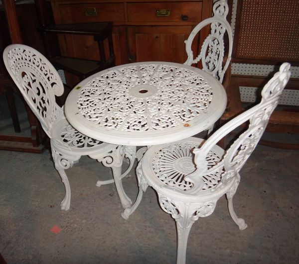 A pair of white painted aluminium garden tables and seven assorted white painted aluminium chairs.