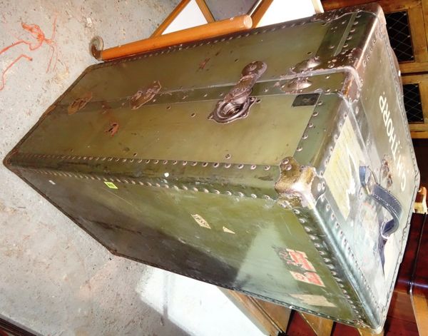 An early 20th century green painted wardrobe travelling trunk.