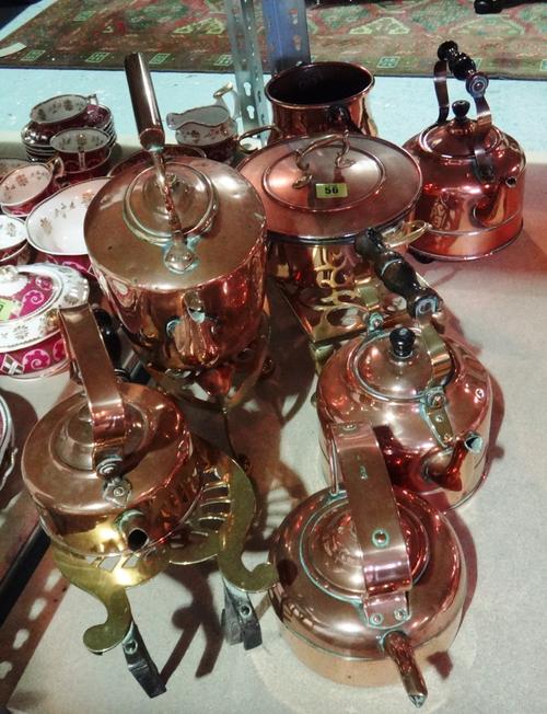 A quantity of copper and brass metalware, including trivets, kettles, pots and sundry. (qty)