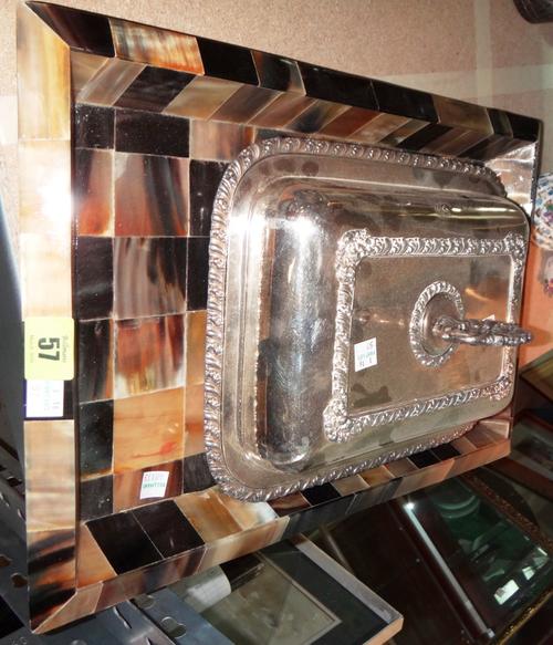 A horn tray and a silver plated entree dish.