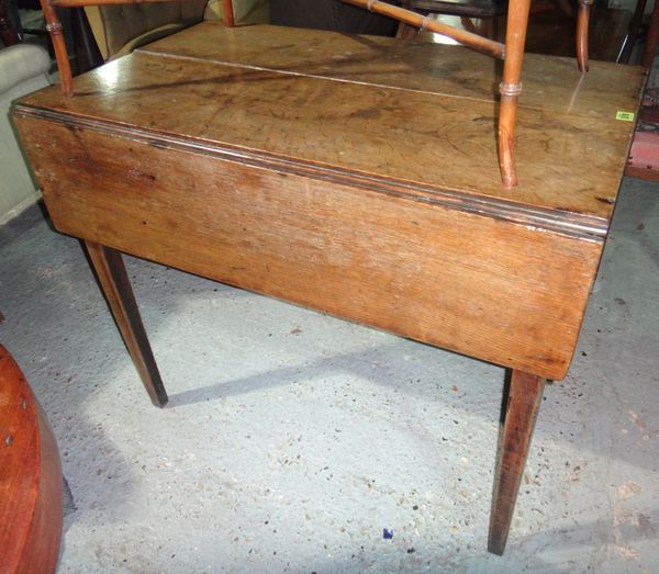 A 19th century oak rectangular Pembroke table.