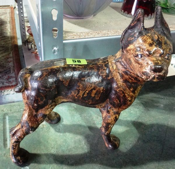 A cast iron metal model of a French bulldog.