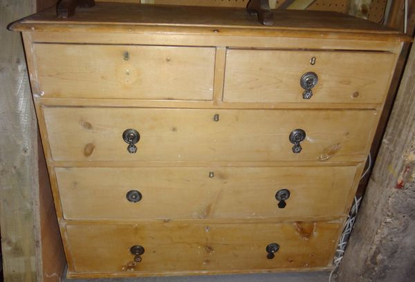 A Victorian pine chest of two short and three long drawers.