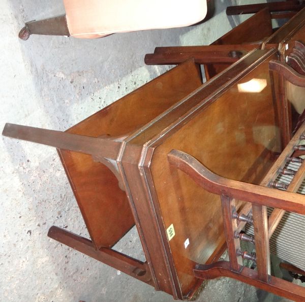 A pair of 20th century mahogany rectangular two tier side tables. (2)