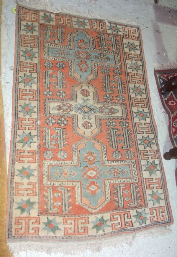 A modern mat of Kazak design.