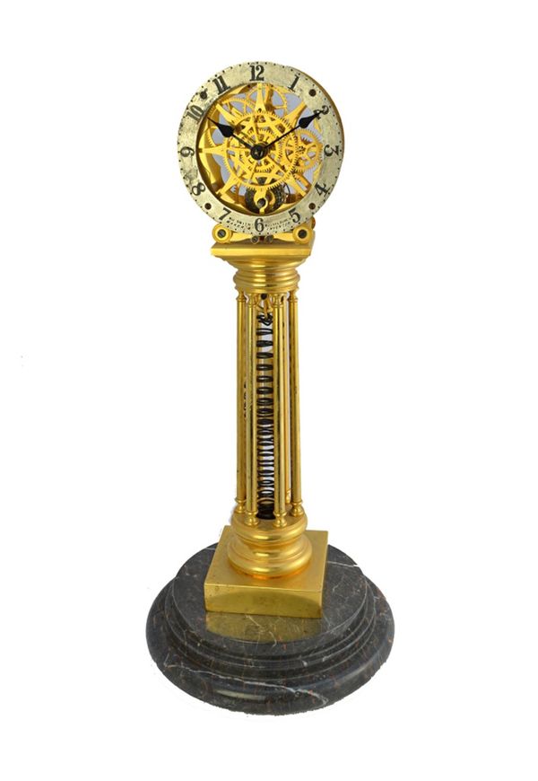 A gilt brass 'Musselburgh' skeleton timepiece after a design by William Smith, with fusee coiled spring movement, silvered chapter ring, six pillared