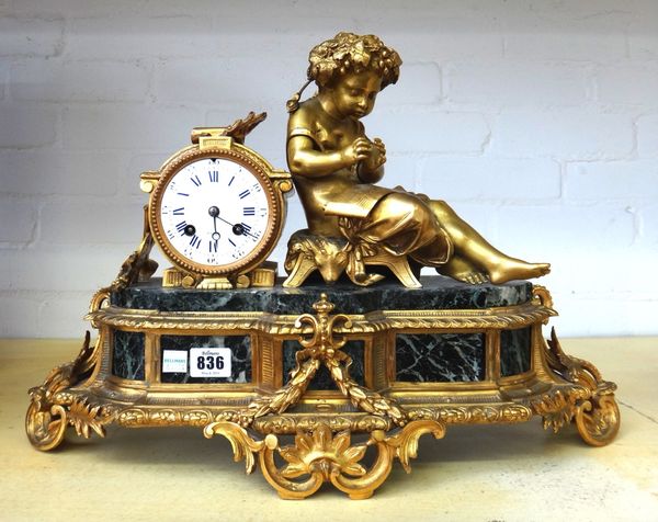 A French gilt bronze and marble mantel clock, circa 1880, with green marble base and inset panels, the drum case with white enamel dial and bell strik
