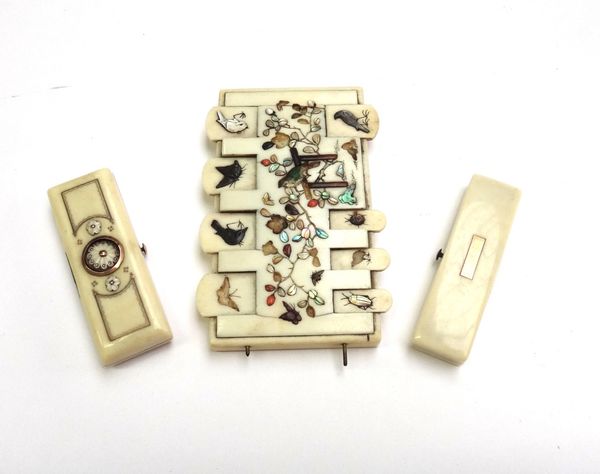Two George III ivory toothpick boxes and a 19th century Japanese ivory inlaid gaming counter, 8.5cm wide. (3)