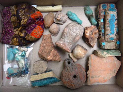 A quantity of Egyptian antiquities and other related items, including; two Shabti, a Greek terracotta oil lamp (7.5cm high), a terracotta monkey figur