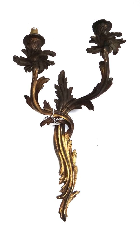 A set of four Louis XV style ormolu two light wall appliques, 40cm high, and two others. (6)