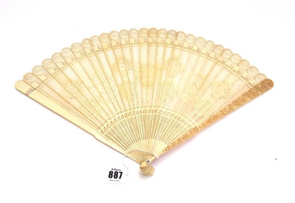 A Cantonese carved ivory fan, early 20th century, shield monogrammed to the centre 'F.W.', with ornately carved sticks, 26cm.