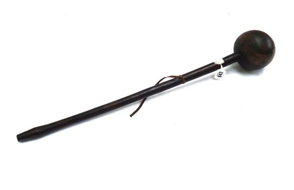 A hardwood Ulas or throwing club, early 20th century, of typical form, 65cm.