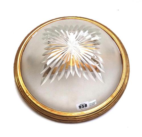 A pair of brass and frosted glass ceiling lights, 20th century, with star cut decoration, 33cm dia, and one larger matched domed ceiling light. (3)