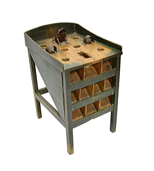 An unusual wooden and metal mounted gaming table, 19th century, green painted, with iron frog and hooped attachments, on four square legs, 81cm high.