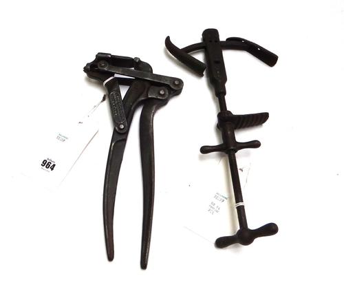 An unusual cobblers tool, dated 1882 and a steel surgical instrument detailed 'The Holborn Surgical Instruments London' (30cm) (2).