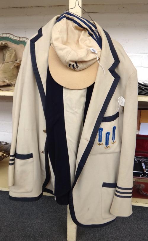 A Vintage sports blazer and cap, early-mid 20th century, possibly Rugby Union or Cricket embroidered with The Prince of Wales three blue feathers agai