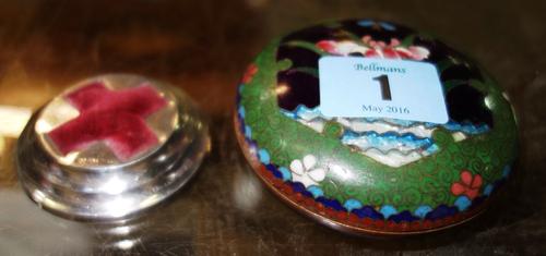 A Japanese box and cover and a silver pin cushion with red cross motifs. (2)