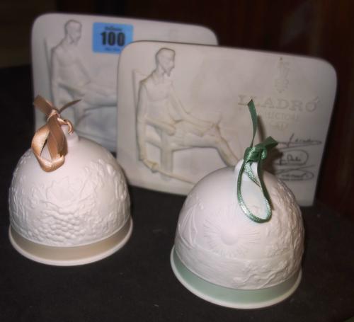 A pair of Iladro collectors society plaques and two matte glaze Iladro bells.