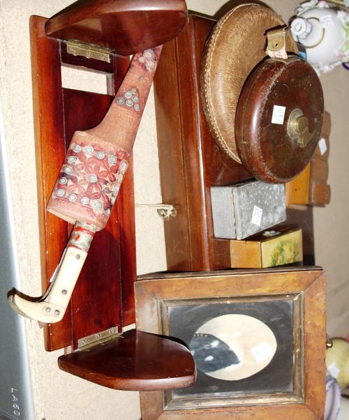A quantity of collectables, including a mahogany box, two tape measures, a book rest, other small boxes and sundry. (qty)
