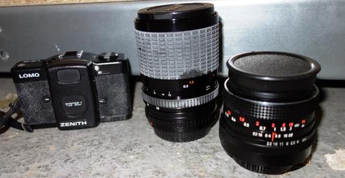 A quantity of 20th century cameras and accessories. (qty)