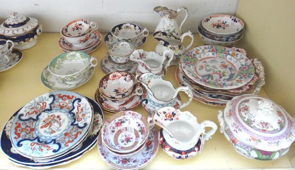 A group of Ridgway porcelain part tea services, second quarter of the 19th century, with various printed and coloured patterns, comprising; 5 milk jug