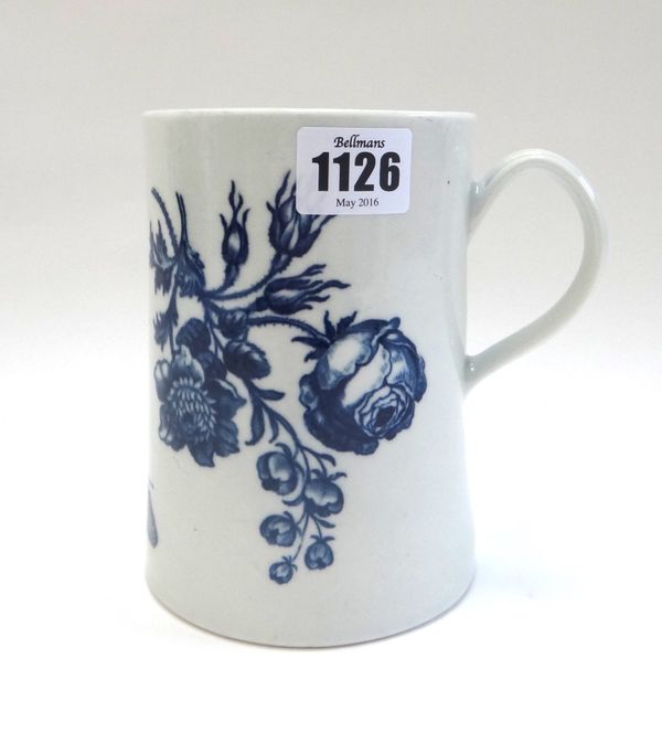 A Worcester blue and white mug, circa 1770, of cylindrical form with a slightly spreading base, transfer printed with the `Natural Sprays Group', blue
