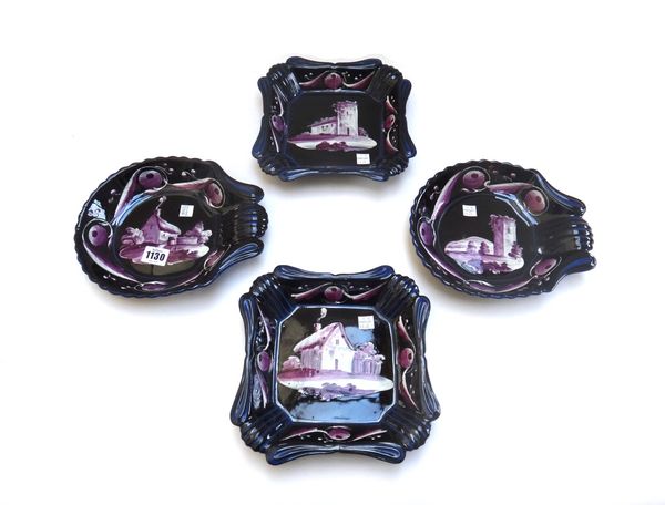 Two pairs of English earthenware dessert dishes, possibly by Lakin & Co., circa 1820, each enamelled in purple and white with a cottage or church in a