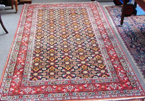 Five Royal Doulton flambe ware animals, early 20th century, comprising; a dachshund, a rabbit, a pelican, a grouse and a sea bird ashtray, the tallest