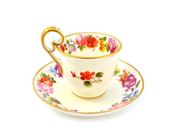A good Nantgarw coffee cup and saucer by Thomas Pardoe, circa 1818-20, each painted with a continuous band of garden flowers beneath gilt line rims, t