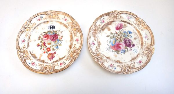 A pair of Nantgarw porcelain plates, circa 1820, each painted in the centre with a bouquet of flowers within a moulded rim picked out in gilding, impr