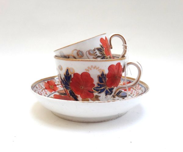 A group of eleven English porcelain trios, mostly Ridgway, early 19th century, the majority of London shape, one trio with matching coffee cup and tea