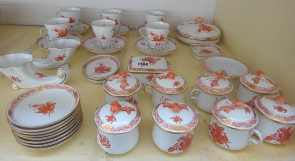 A quantity of Herend porcelain, decorated with gilt orange flowers against a relief basket weave border, comprising; six trembluese cups and saucers,