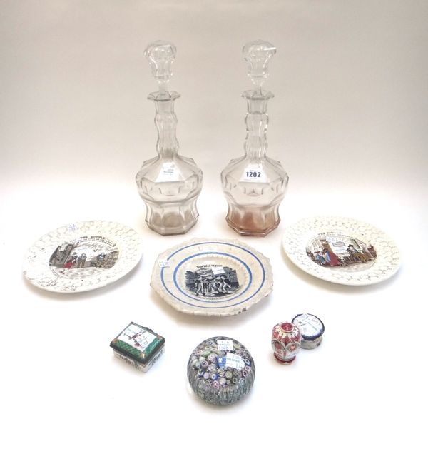 A group of ceramics and glass, mostly 19th century, comprising; a pair of glass decanters and stoppers; three pottery nursery plates; a Millefiori pap