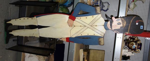 A 20th century fret cut floor standing model of a French soldier.