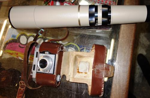 A 20th century cased monocular telescope and an Agfa camera. (2)