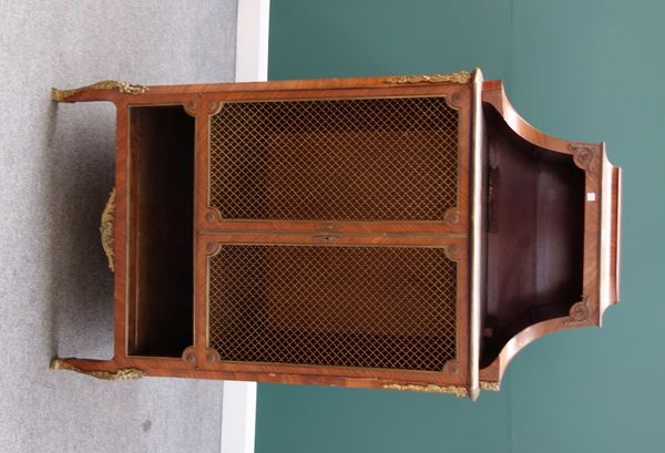 A 19th century French gilt metal mounted Kingwood side cabinet, with open shelf top over a pair of brass grille doors and further recess, on cabriole