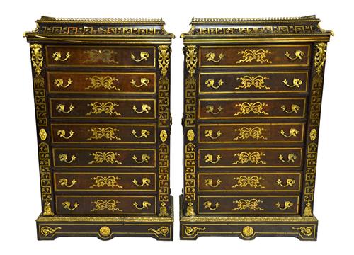 A pair of late 19th century gilt metal mounted mahogany Semaniers, each of the seven drawers enclosed by locking bar, on plinth base, 87cm wide x 127c