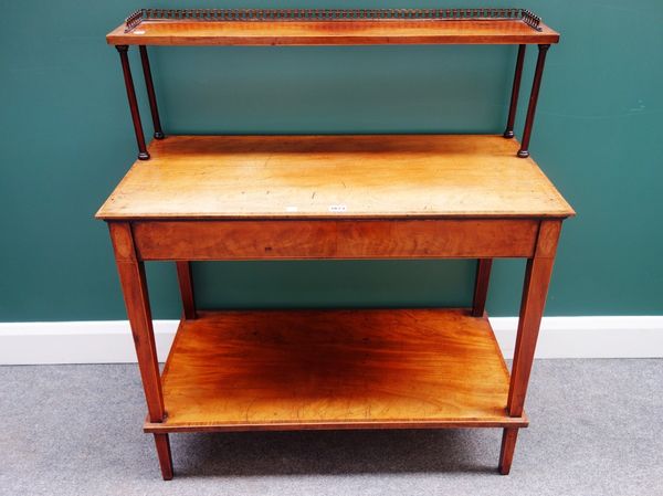 An inlaid mahogany side table, the open shelf back over two rectangular platforms, on tapering square supports, 87cm wide.