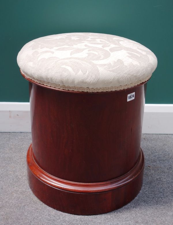 A 19th century mahogany cylindrical stool, with padded lift top and plinth base, 45cm wide.