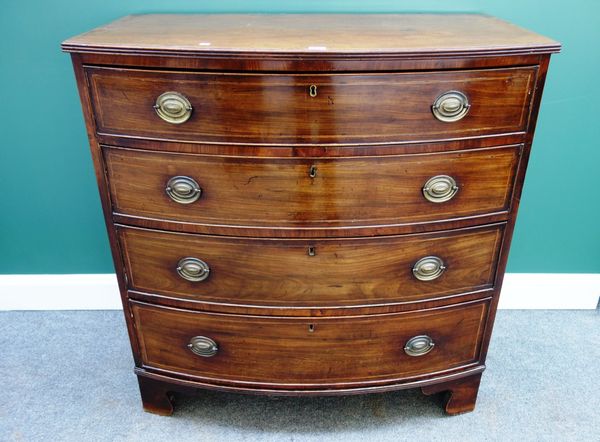 A Regency mahogany bowfront chest of four long graduated drawers, on bracket feet, 100cm wide.