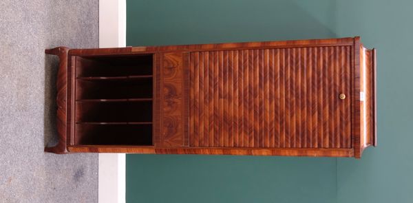 An early 20th century French inlaid and crossbanded kingwood music cabinet, with drop down tambour front over divided lower tier, on squat cabriole su