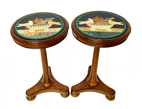 A pair of William IV style occasional tables, each with circular specimen marble tops on turned columns and triform platform, 41cm wide (2). Illustrat