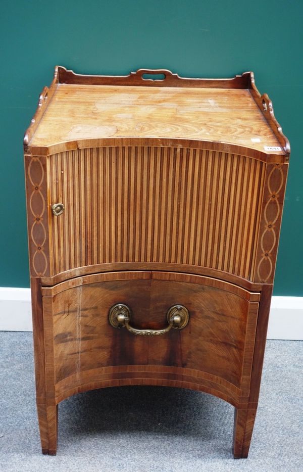 A George III inlaid mahogany night stand, the concave front with tambour panel and pull-out lower drawer, on tapering square supports, 52cm wide.