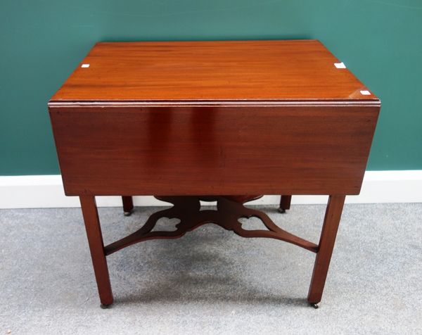 A mid 18th century mahogany drop flap table, with single frieze drawer on canted square supports, united by pierced 'X' frame stretcher, 71cm wide.