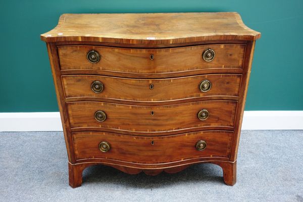 A George III inlaid cross-banded mahogany serpentine chest, the top fitted drawer over three further long graduated drawers, on splayed bracket feet,