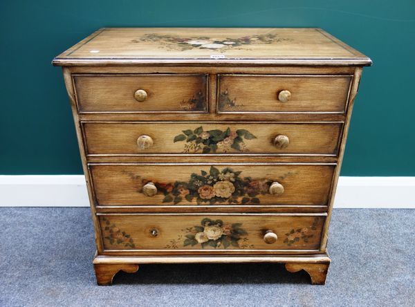 A small mid 18th century style floral and scumble painted chest of two short and three long graduated drawers, on bracket feet, 74cm wide.