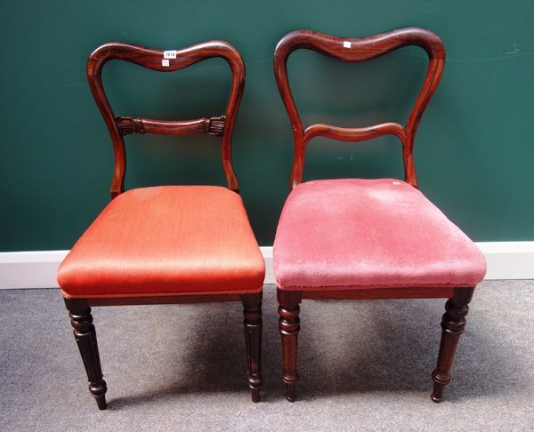 A set of four early Victorian rosewood framed dining chairs, with kidney backs on lappet carved front supports, together with another set of four simi