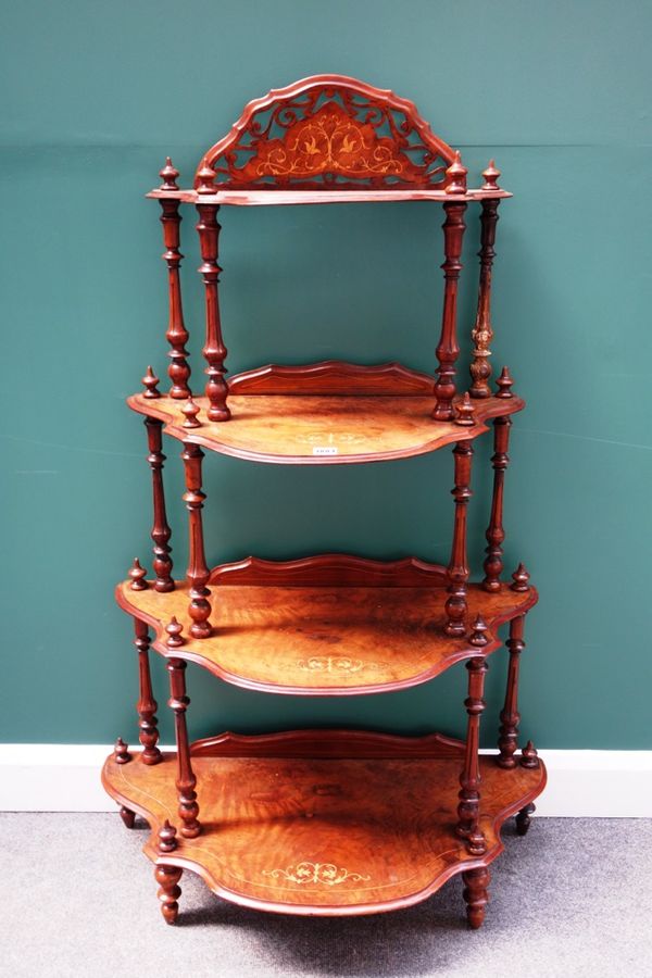 A Victorian marquetry inlaid figured walnut graduated four tier what-not, on turned supports, 82cm wide.