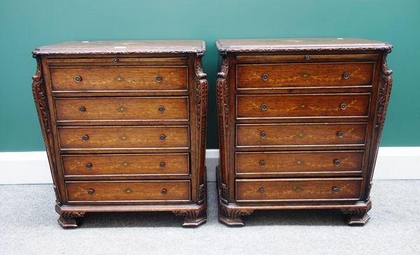 A pair of marquetry inlaid mahogany diminutive chests of 18th century style, each with brushing slide over five long graduated drawers, flanked by car